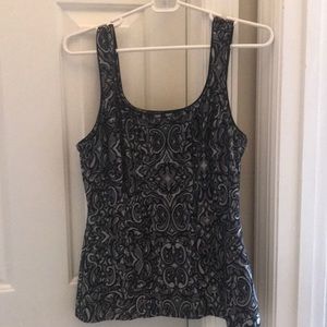 Silver, black tank